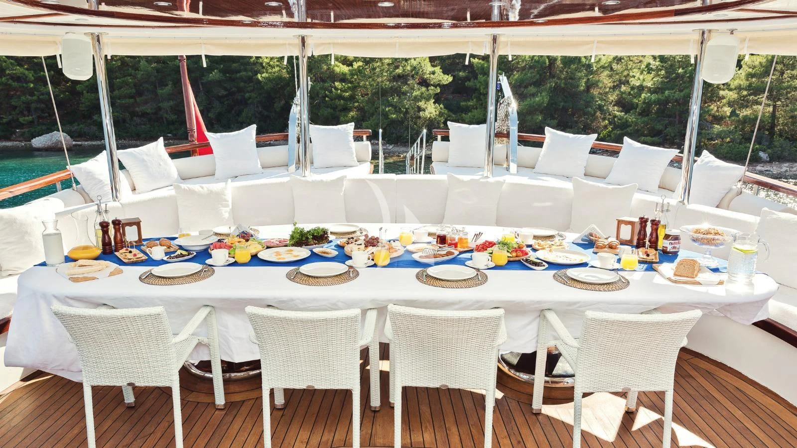 a table set for a dinner party aboard HALCON DEL MAR Yacht for Sale