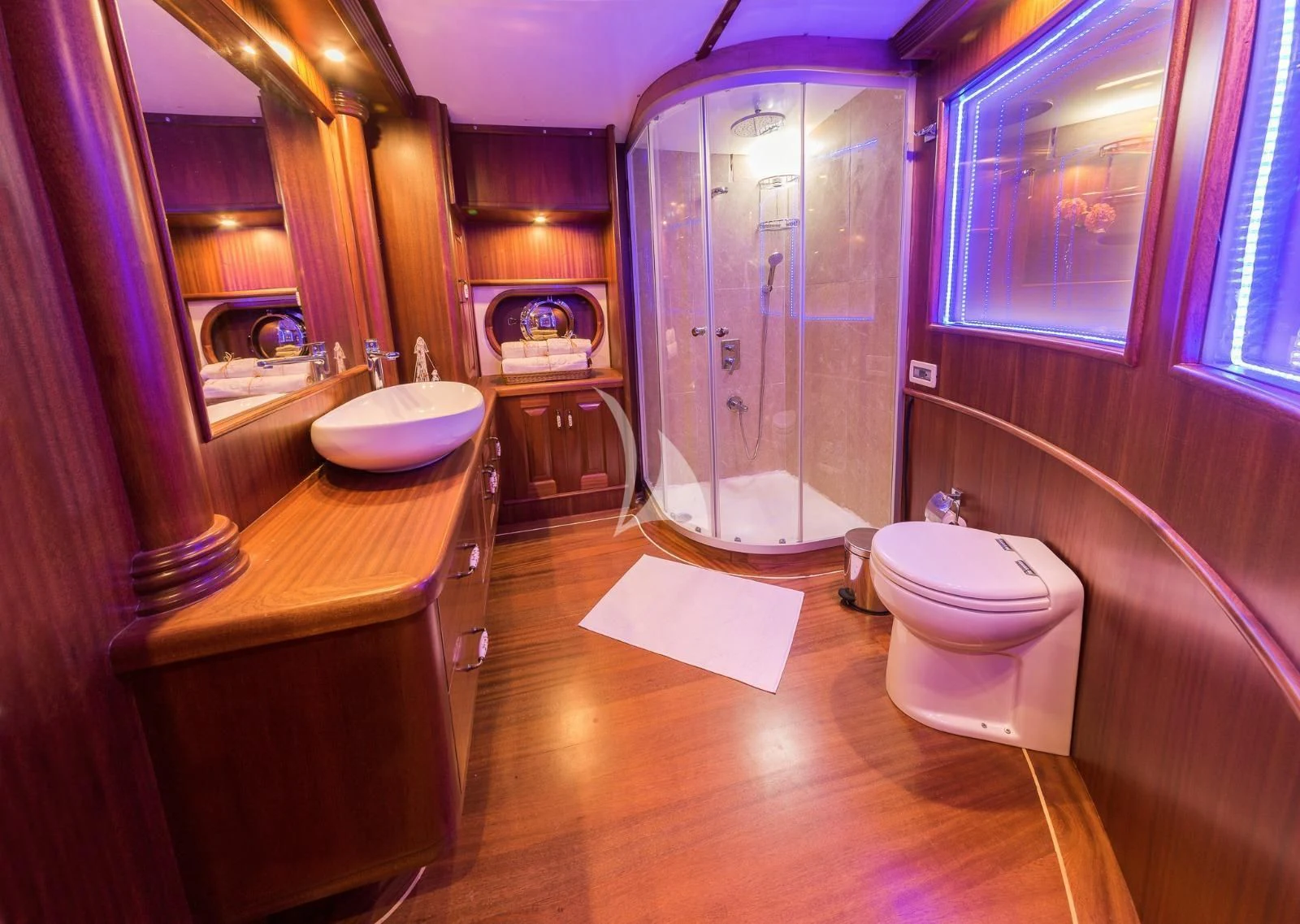 a bathroom with a toilet and sink aboard HALCON DEL MAR Yacht for Sale