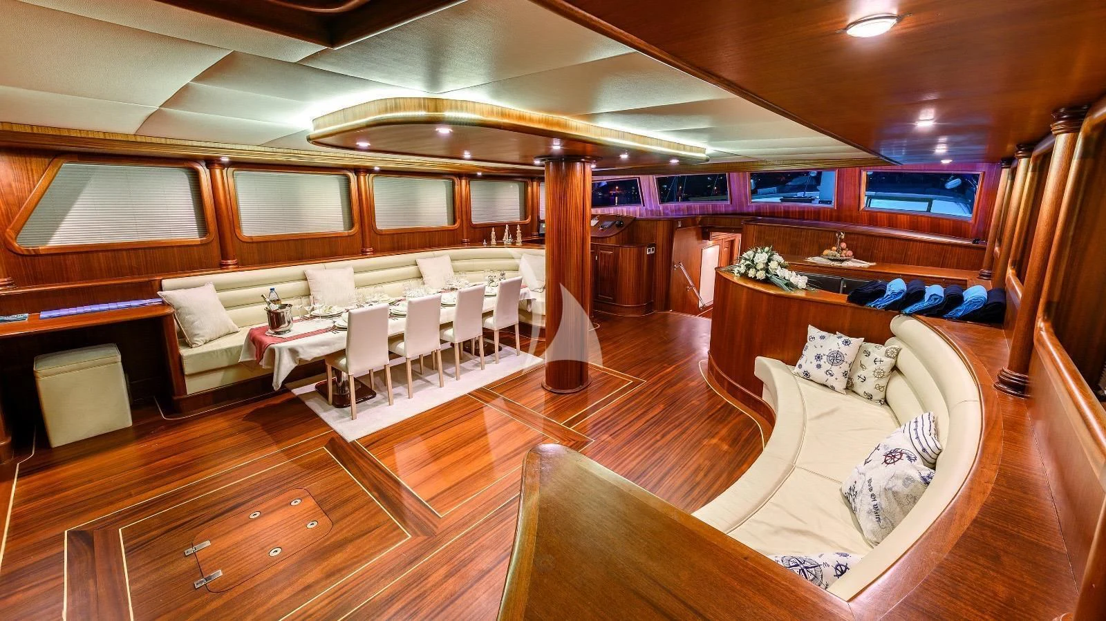 a room with a couch and a table and chairs aboard HALCON DEL MAR Yacht for Sale