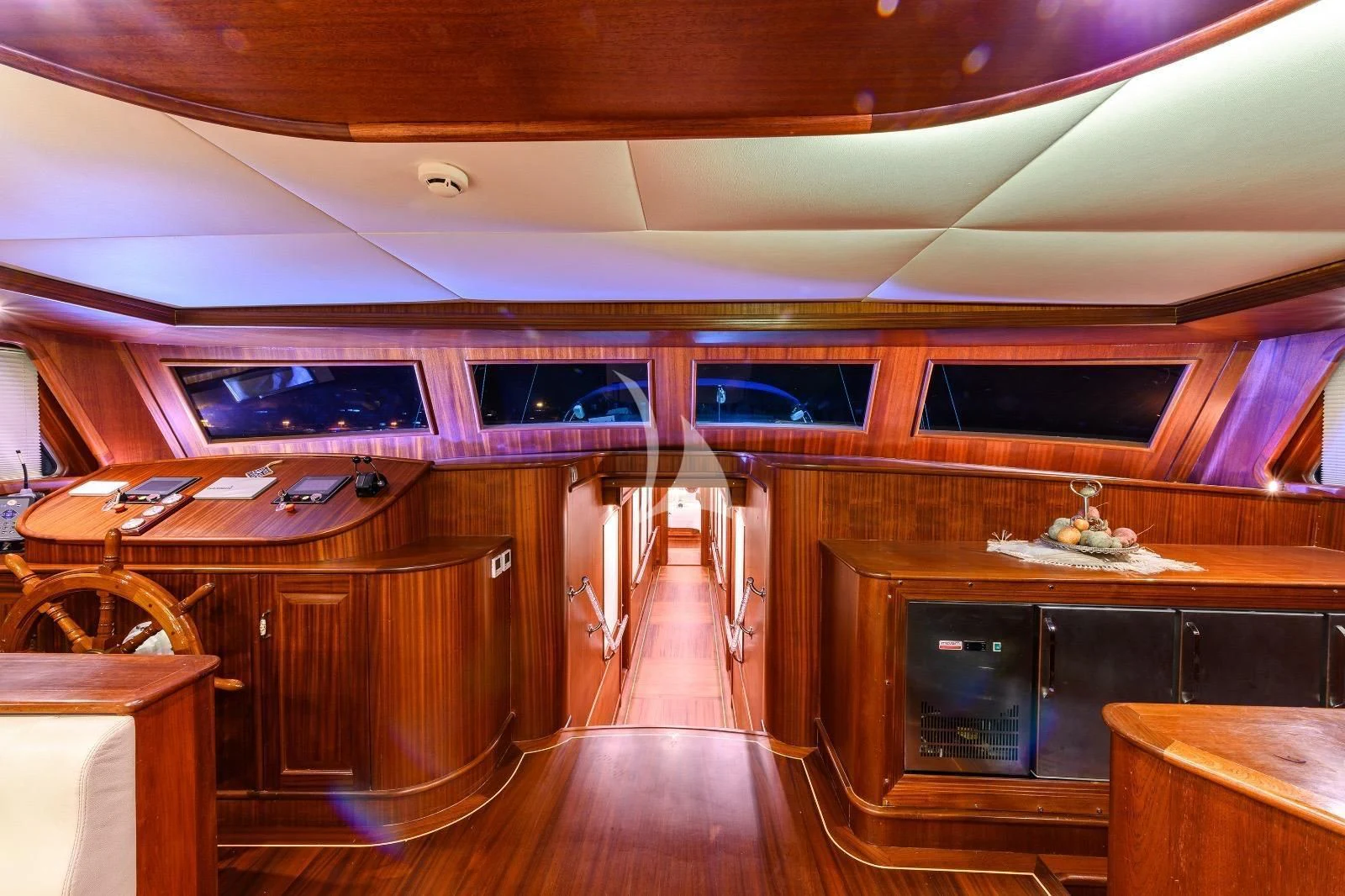 a wooden room with a wood floor aboard HALCON DEL MAR Yacht for Sale