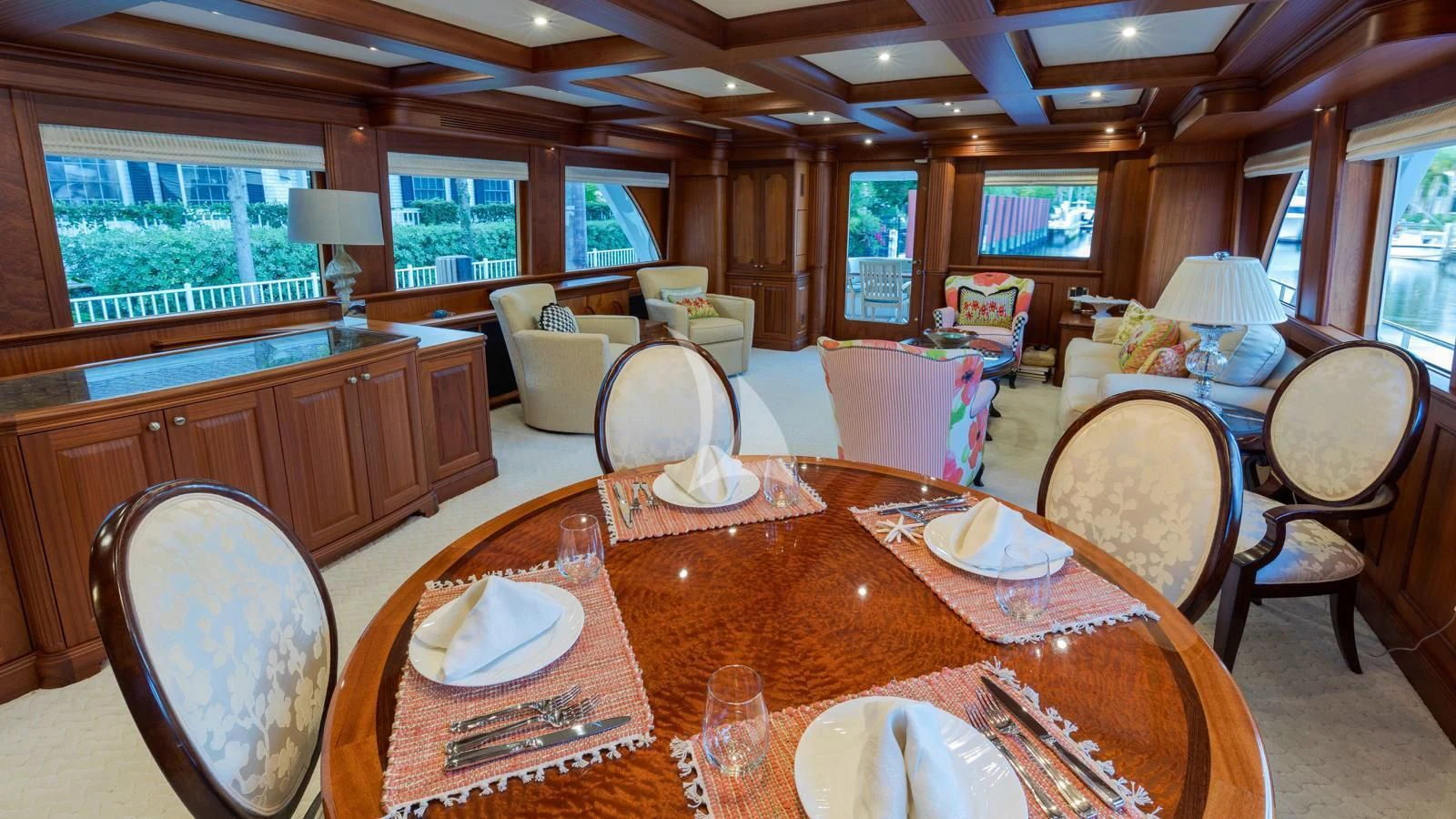 a dining room with a table set aboard ANNDRIANNA Yacht for Sale
