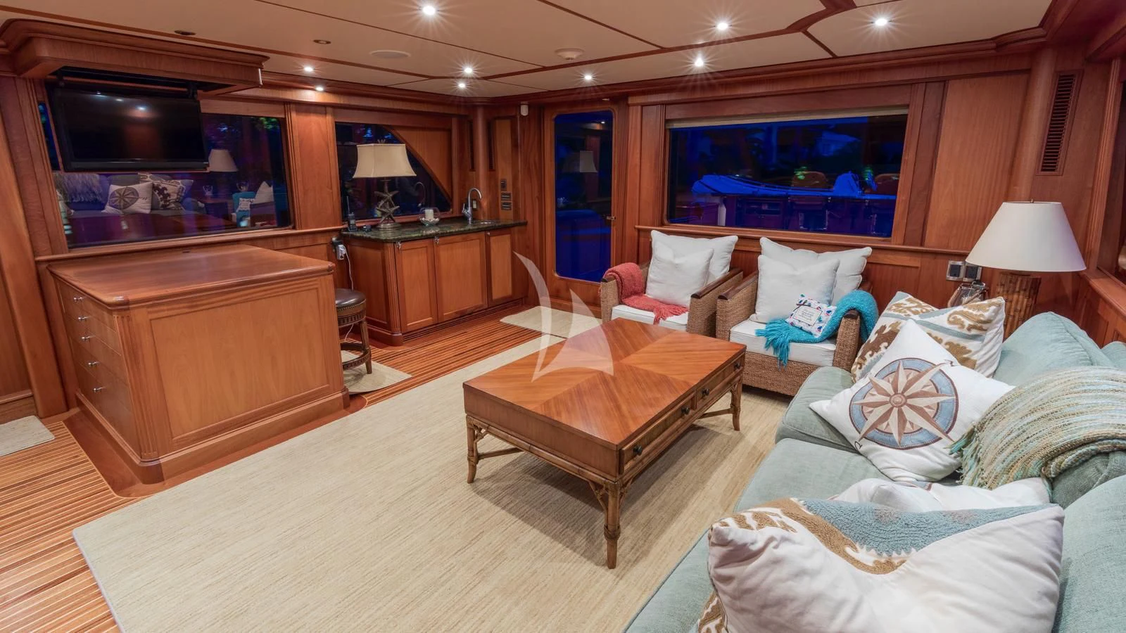 a living room with a couch and a coffee table aboard ANNDRIANNA Yacht for Sale