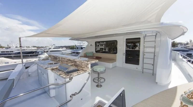 a white tent with a large window aboard ANNDRIANNA Yacht for Sale