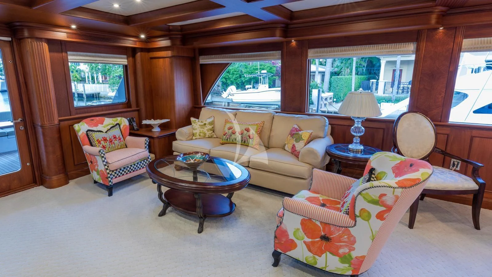 a living room with a couch and a table aboard ANNDRIANNA Yacht for Sale
