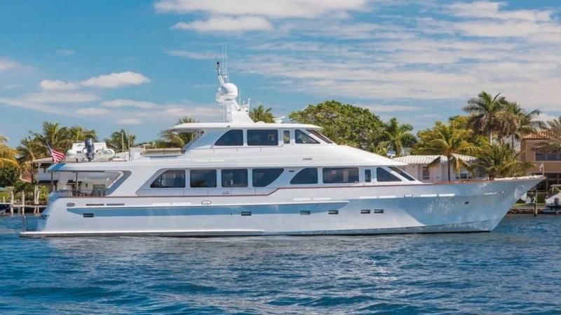 a white yacht on the water aboard ANNDRIANNA Yacht for Sale