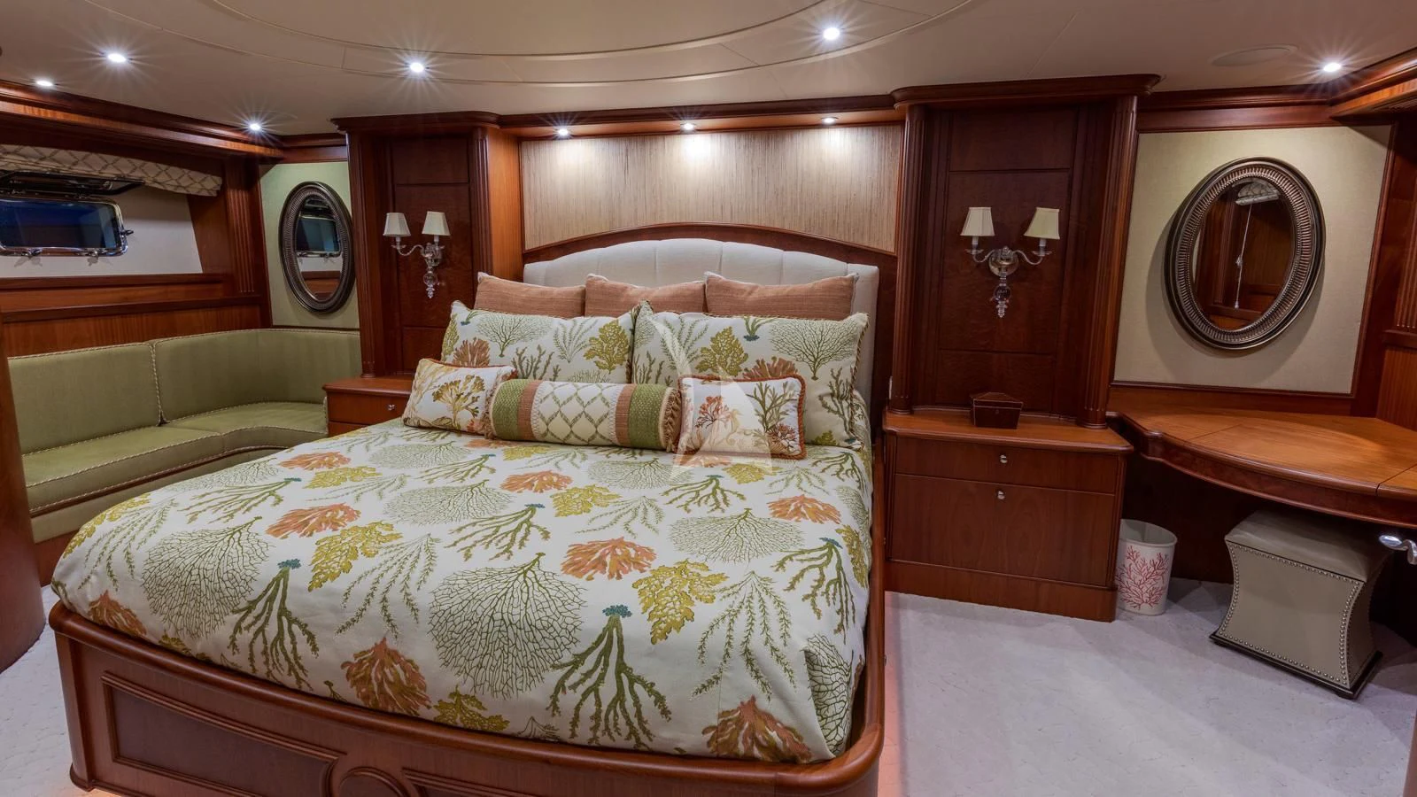 a bed with a mirror above it aboard ANNDRIANNA Yacht for Sale