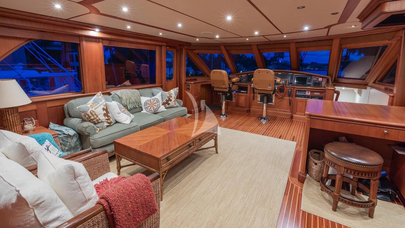 a living room with a couch and a table aboard ANNDRIANNA Yacht for Sale