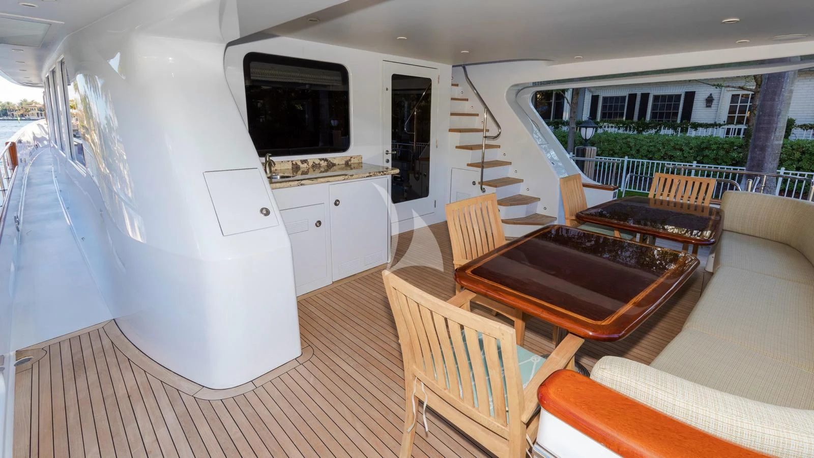 a living room with a couch and a television aboard ANNDRIANNA Yacht for Sale