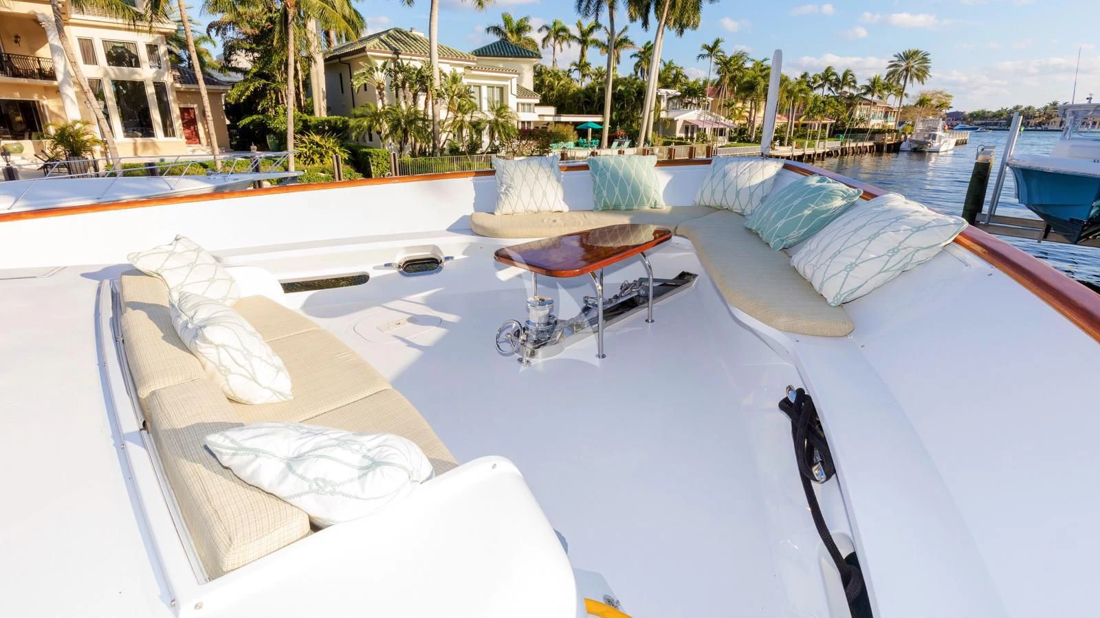 a pool with a table and chairs aboard ANNDRIANNA Yacht for Sale