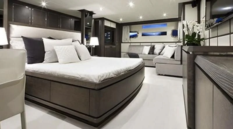 a large bed in a room aboard MUSE Yacht for Sale