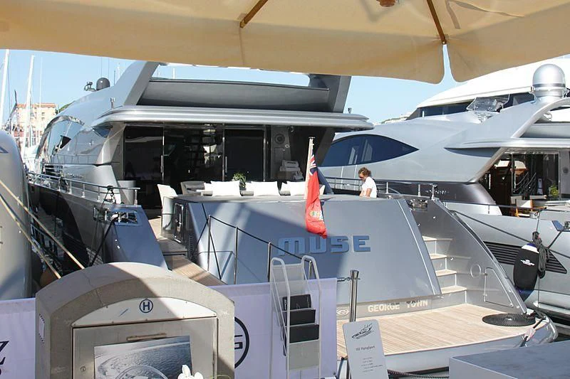 a person standing in a cockpit aboard MUSE Yacht for Sale