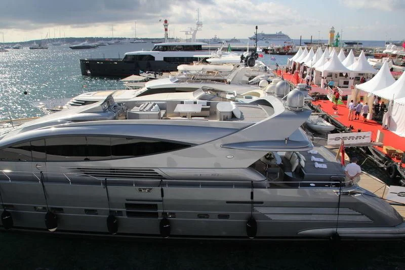 a large yacht on the water aboard MUSE Yacht for Sale
