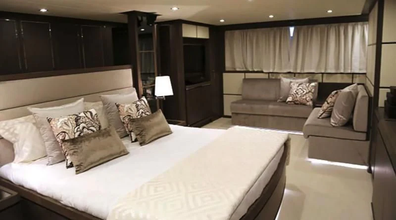 a bed in a hotel room aboard MUSE Yacht for Sale