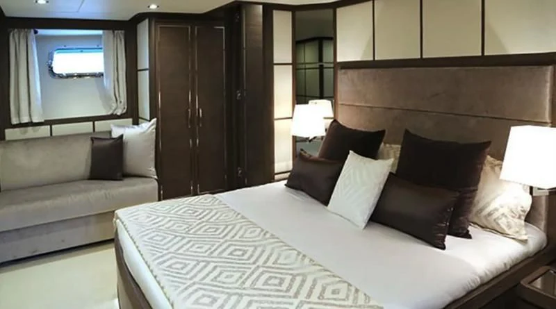 a bed with pillows and pillows aboard MUSE Yacht for Sale
