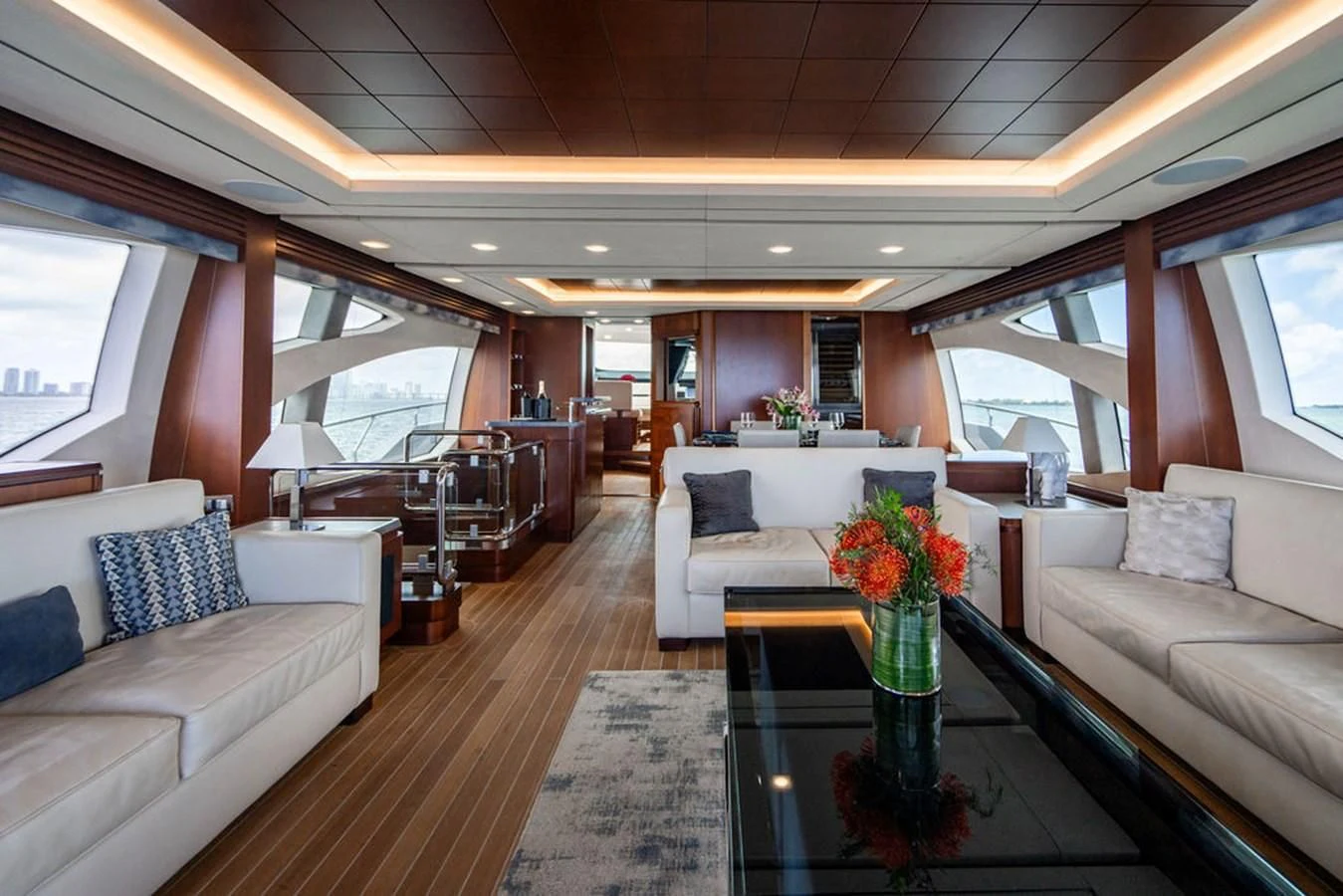 a living room with a large window aboard BM Yacht for Sale