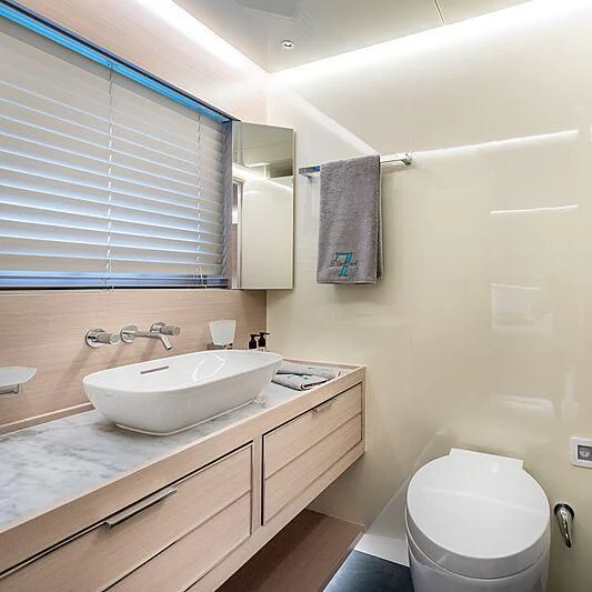 a bathroom with a sink and a toilet aboard MASHA Yacht for Sale