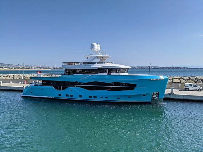 a large boat in the water aboard MASHA Yacht for Sale