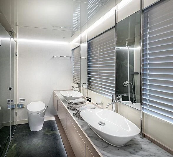 a bathroom with a sink and a shower aboard MASHA Yacht for Sale