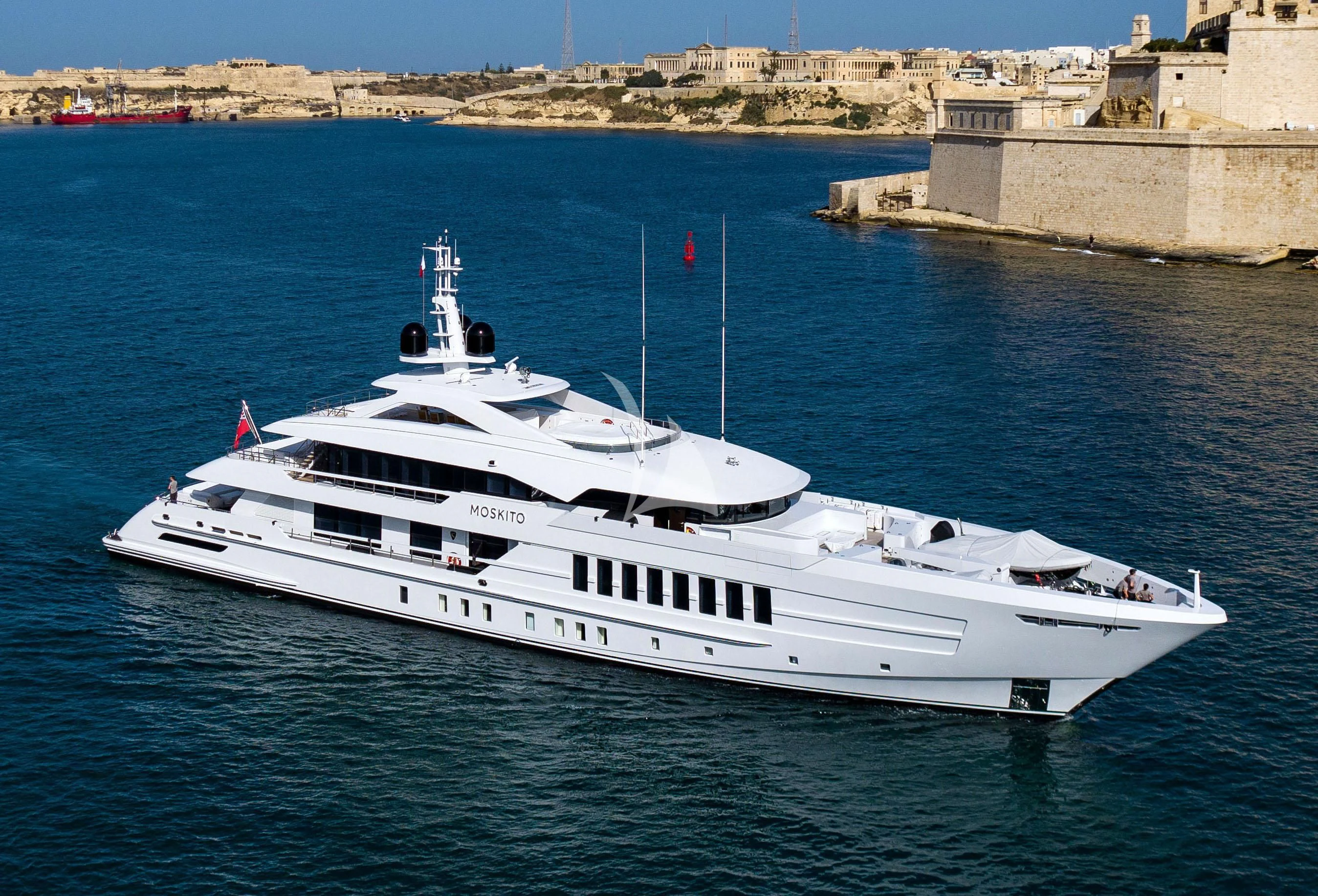 a white boat on the water aboard MOSKITO Yacht for Sale