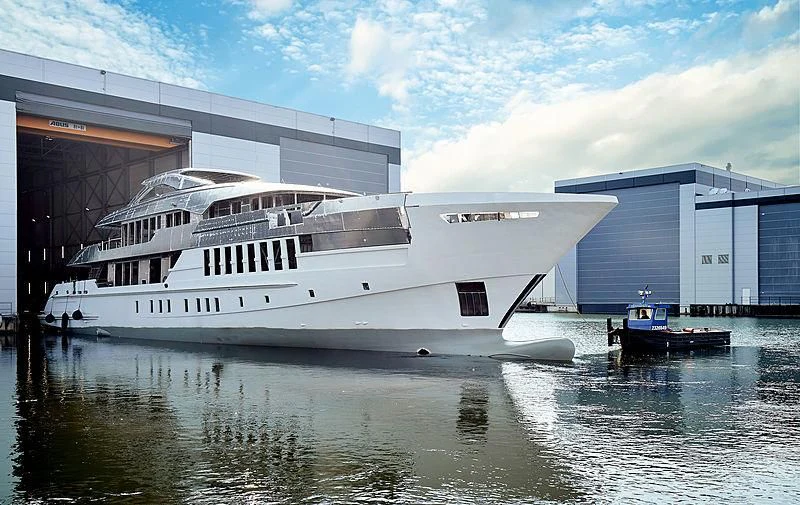 a large white boat in a body of water aboard MOSKITO Yacht for Sale