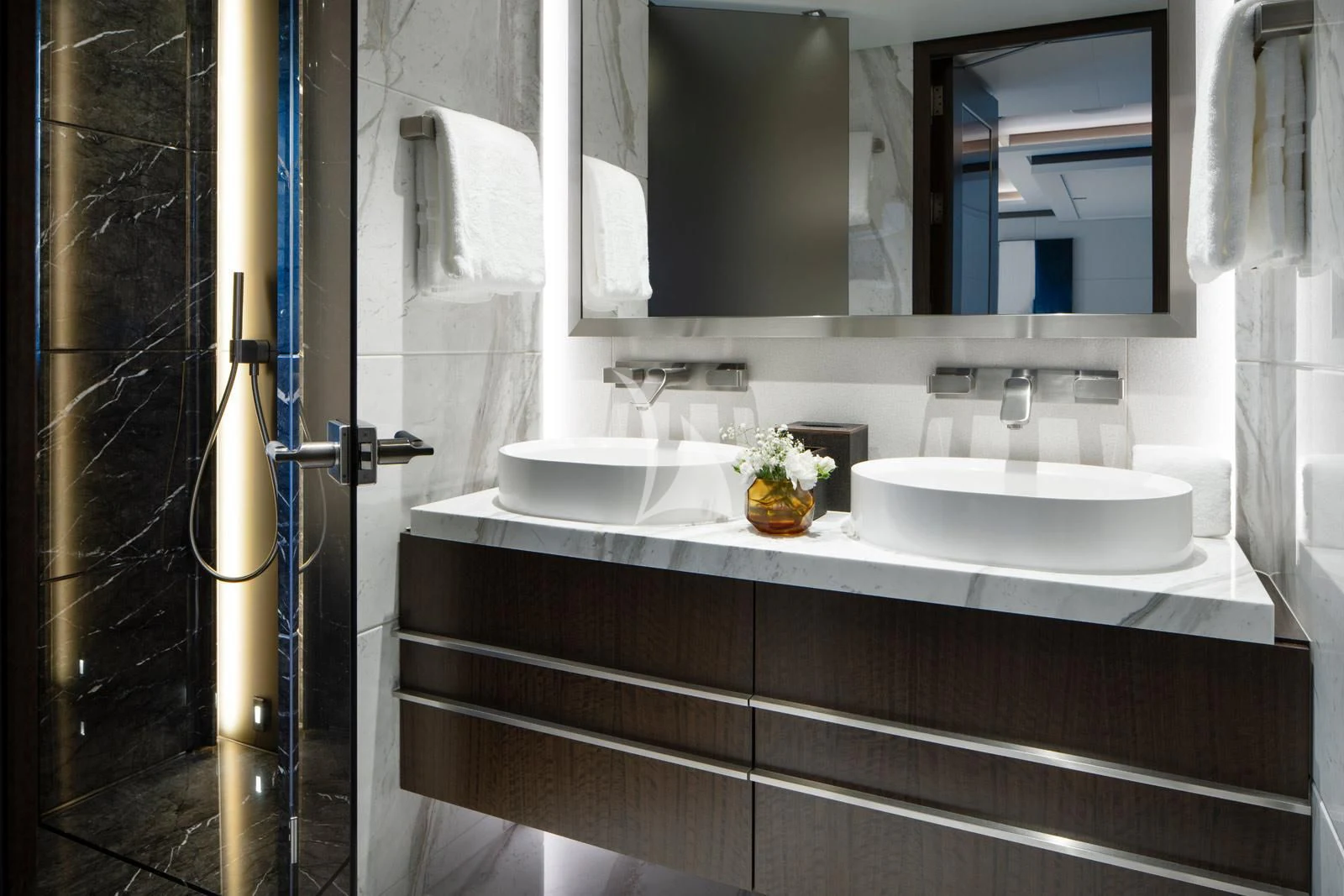 a bathroom with two sinks aboard MOSKITO Yacht for Sale