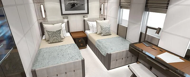 a room with a bed and desk aboard MOSKITO Yacht for Sale