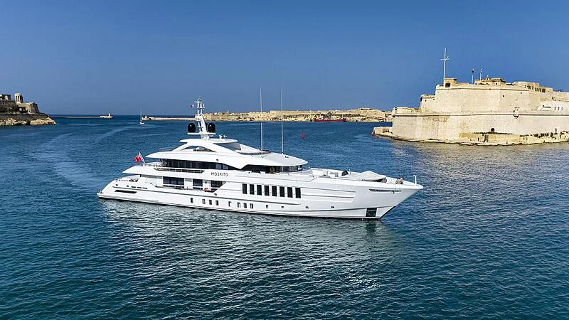 a white boat in the water aboard MOSKITO Yacht for Sale