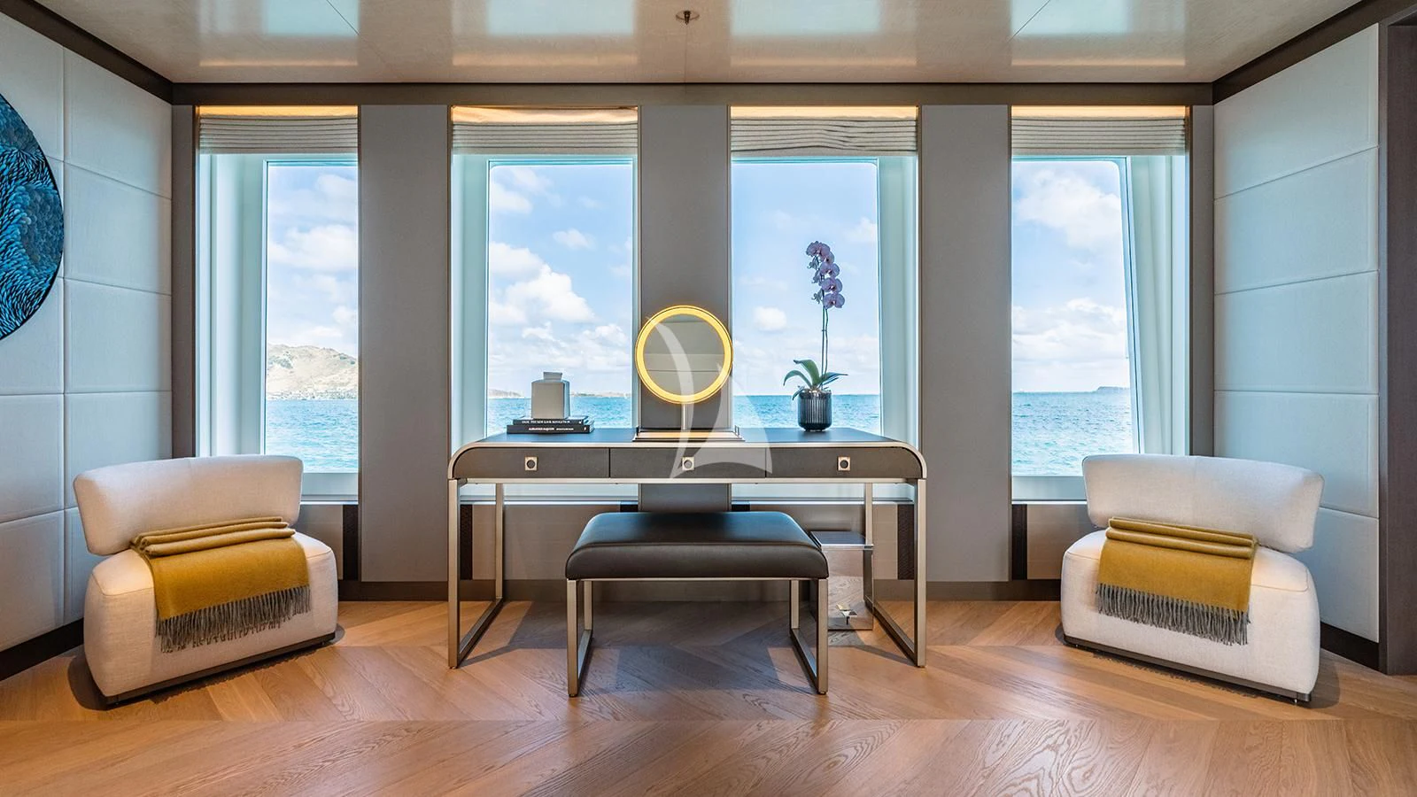 a room with a large window and a table with chairs aboard MOSKITO Yacht for Sale