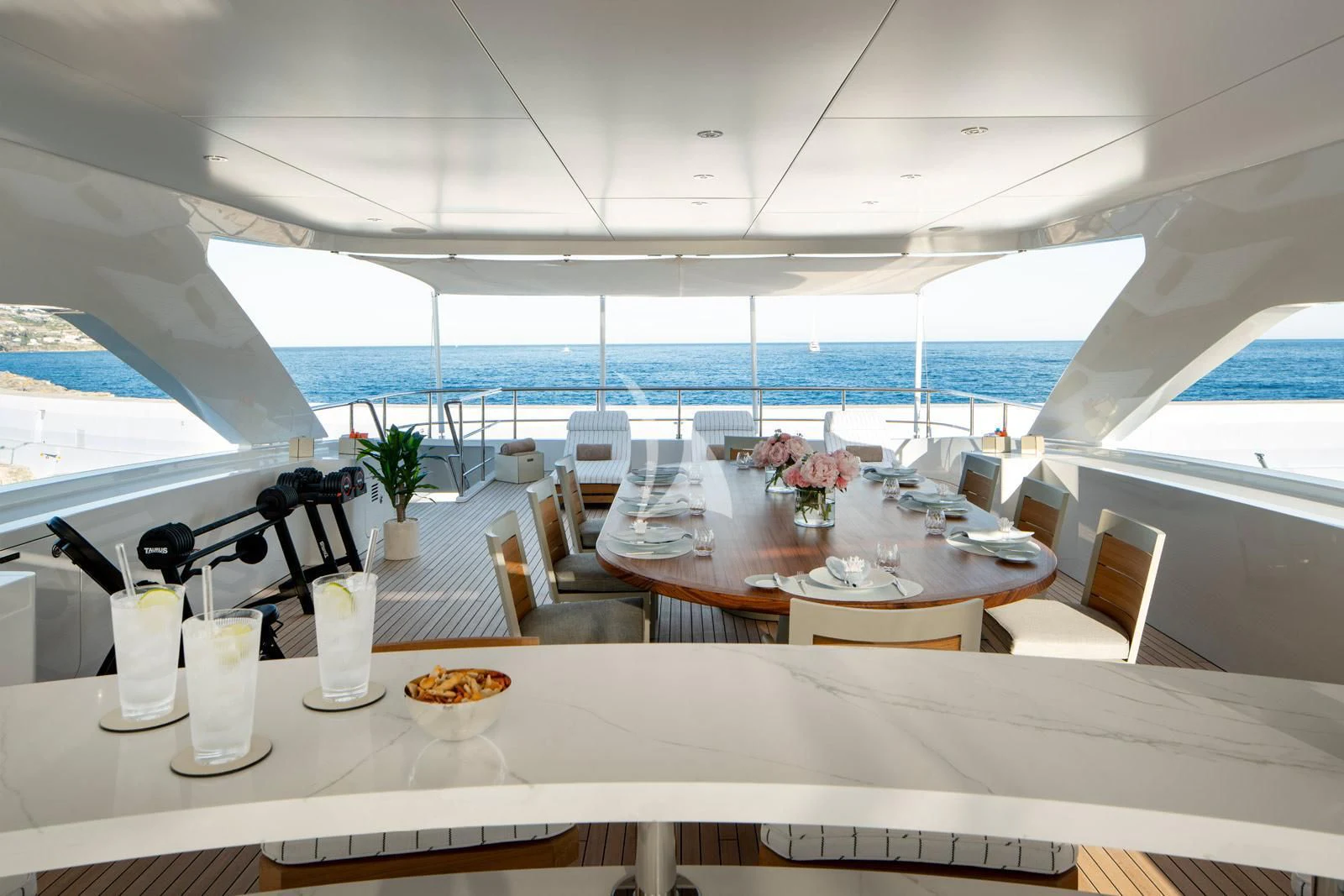 a room with a table and chairs aboard MOSKITO Yacht for Sale