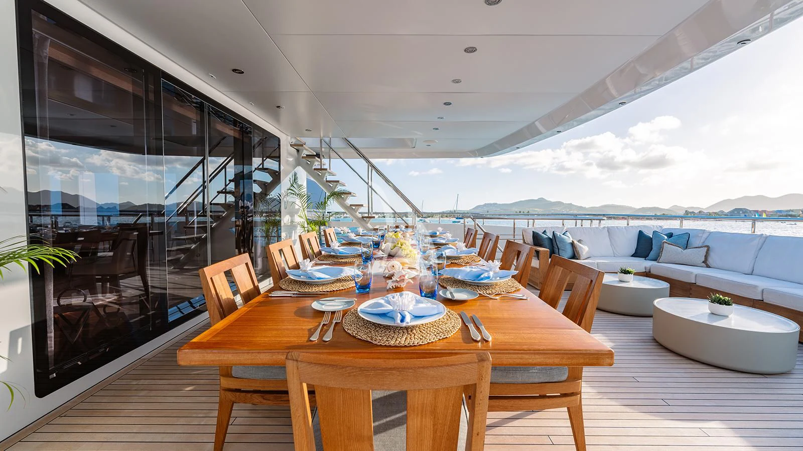 a dining room with a table and chairs aboard MOSKITO Yacht for Sale