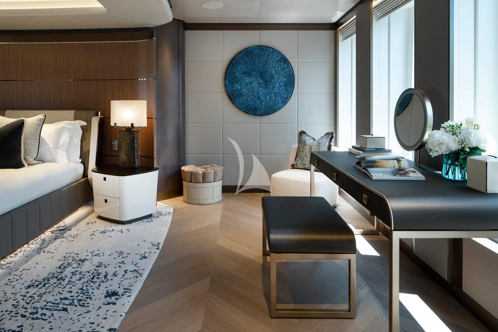 a room with a desk and a bed aboard MOSKITO Yacht for Sale