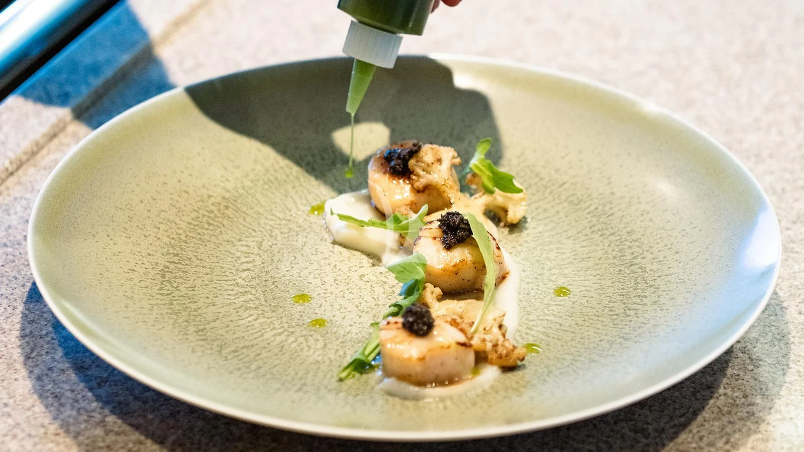 a plate of food aboard MOSKITO Yacht for Sale