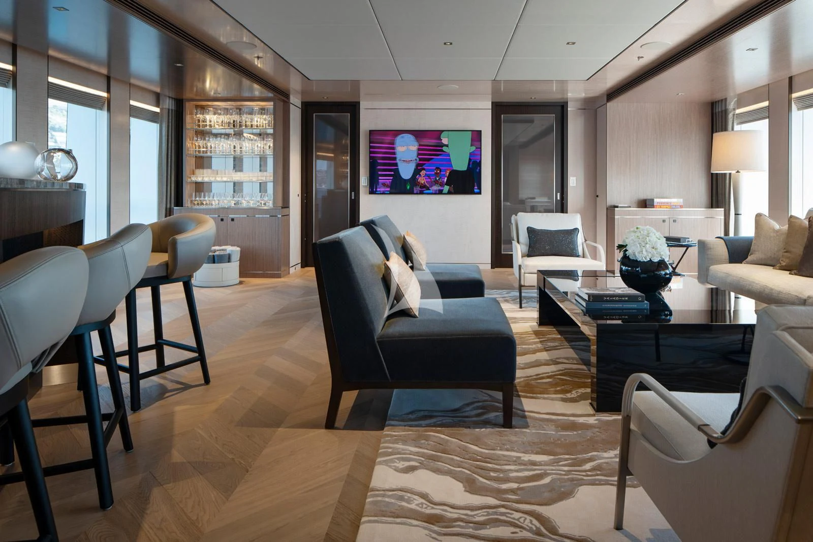 a living room with a large mirror aboard MOSKITO Yacht for Sale