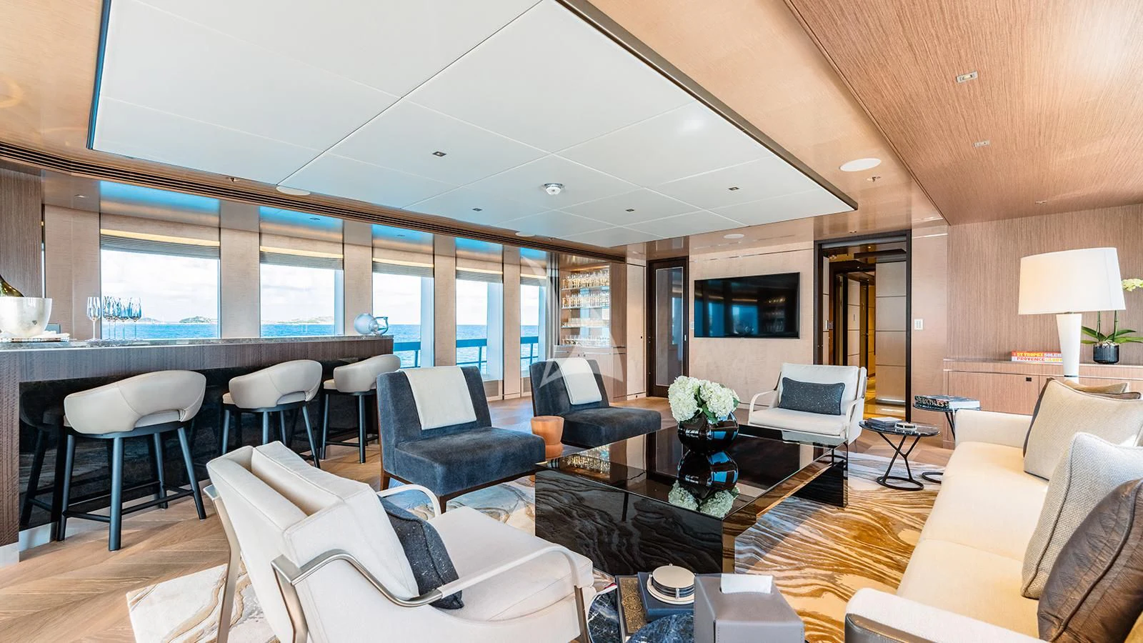 a living room with a large window aboard MOSKITO Yacht for Sale