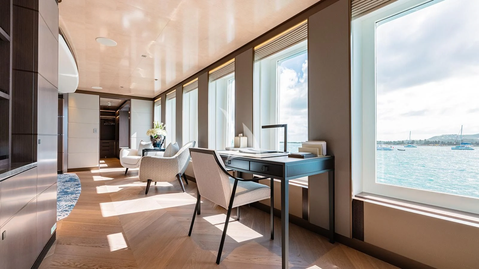 a table and chairs in a room aboard MOSKITO Yacht for Sale
