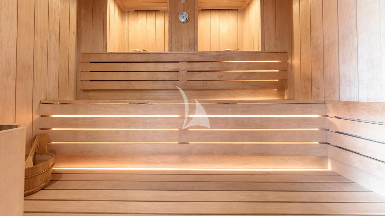 a wooden staircase with a cat on it aboard MOSKITO Yacht for Sale