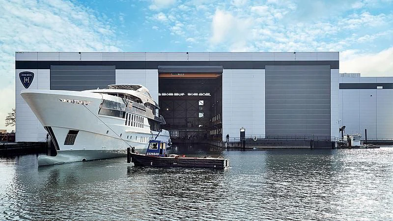 a boat docked in front of a building aboard MOSKITO Yacht for Sale