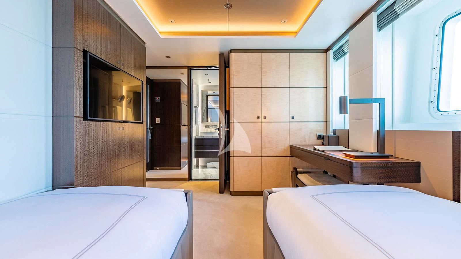 a room with a bed and a desk aboard MOSKITO Yacht for Sale