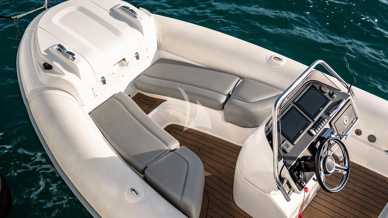 a white car with a steering wheel aboard MOSKITO Yacht for Sale
