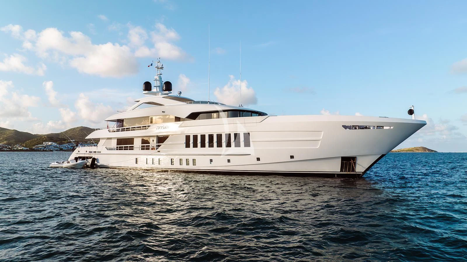 a large white ship in the water aboard MOSKITO Yacht for Sale