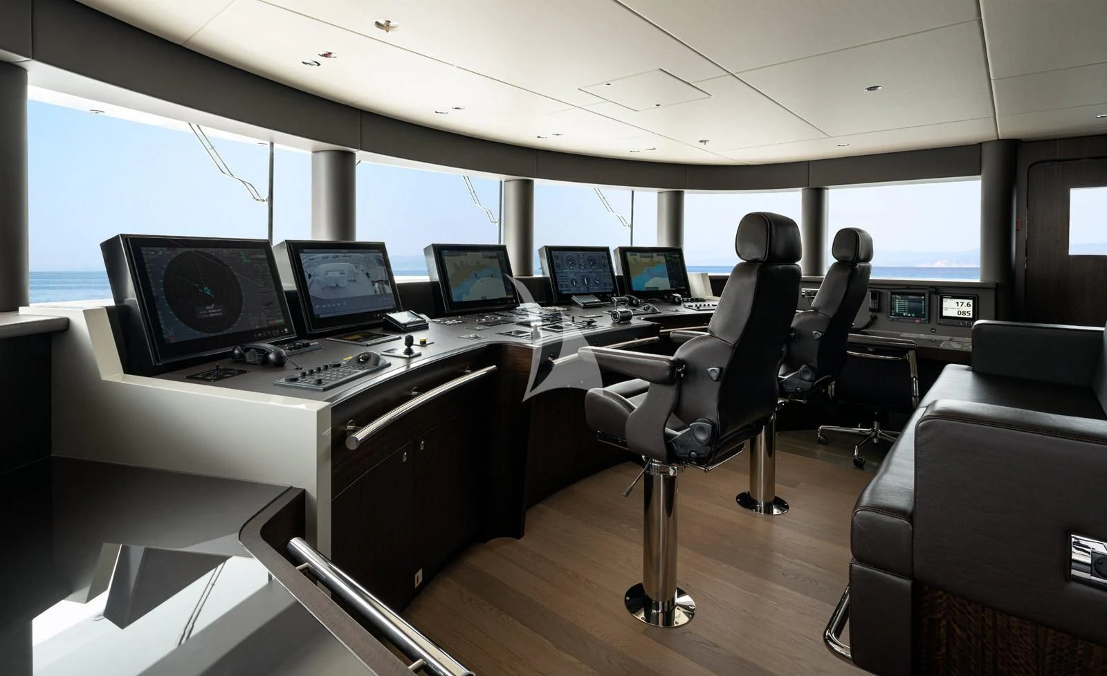 a room with computers and chairs aboard MOSKITO Yacht for Sale