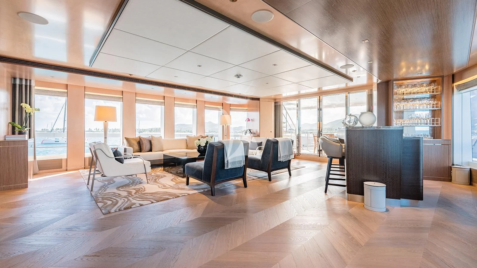 a room with a wood floor and a fireplace aboard MOSKITO Yacht for Sale