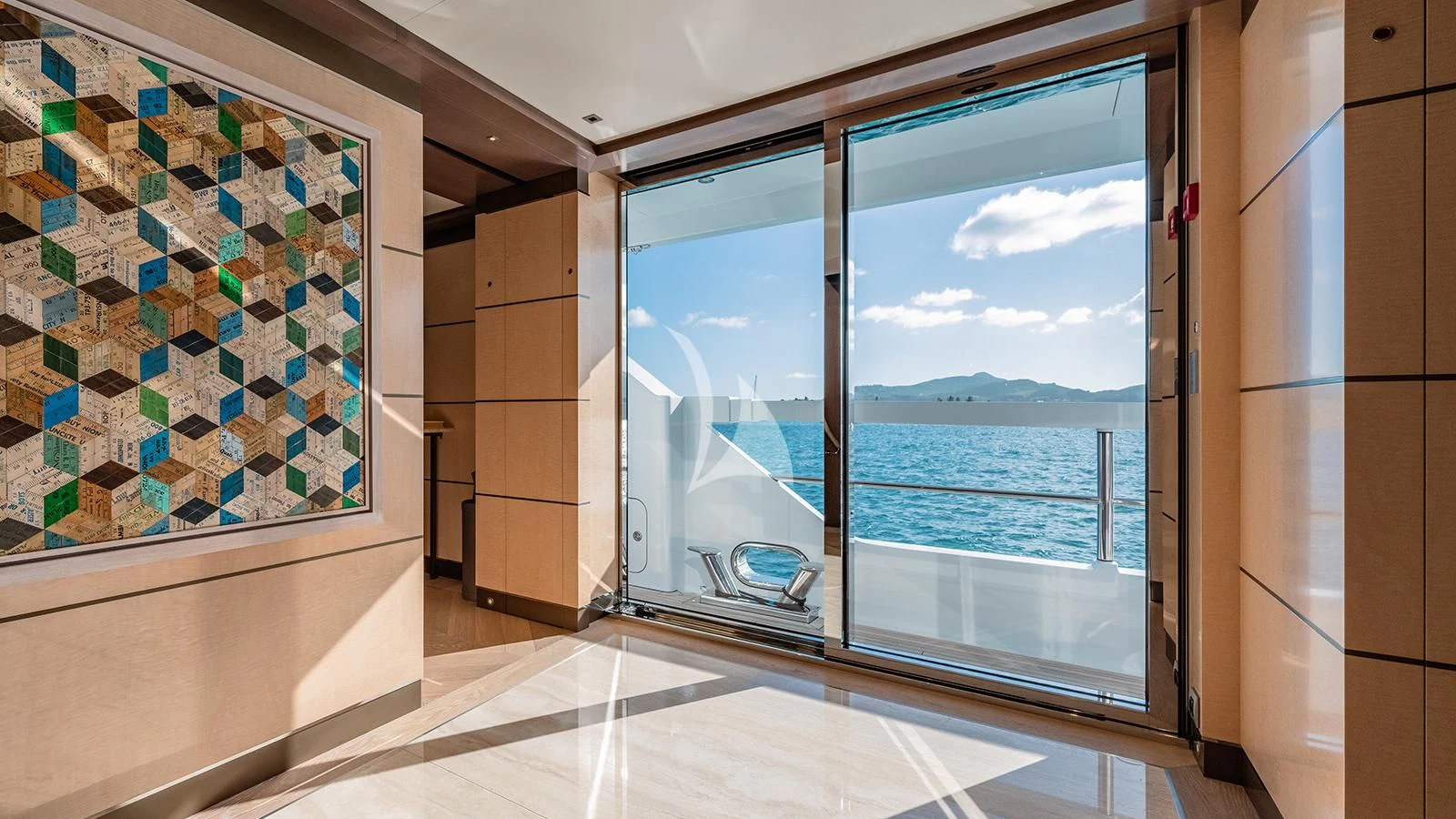 a room with a large window and a view of the ocean aboard MOSKITO Yacht for Sale