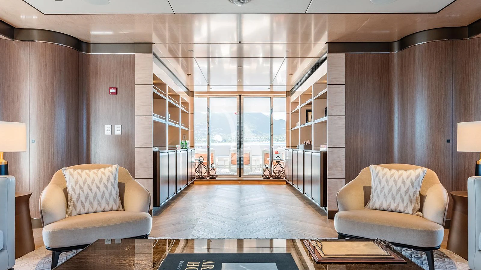 a living room with a large window aboard MOSKITO Yacht for Sale