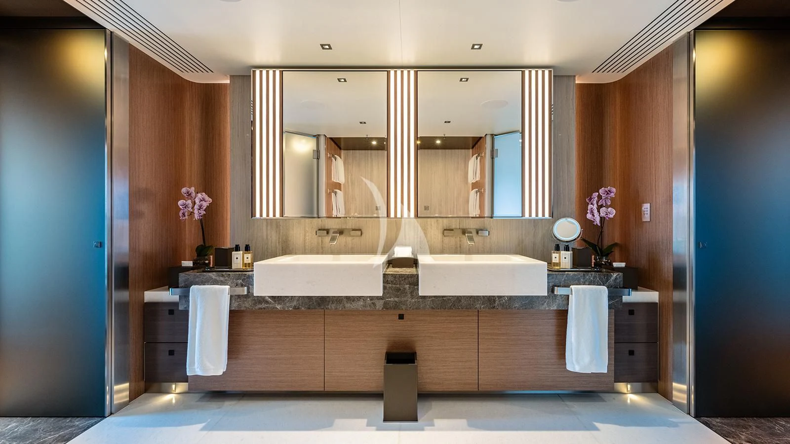 a bathroom with a large mirror aboard MOSKITO Yacht for Sale