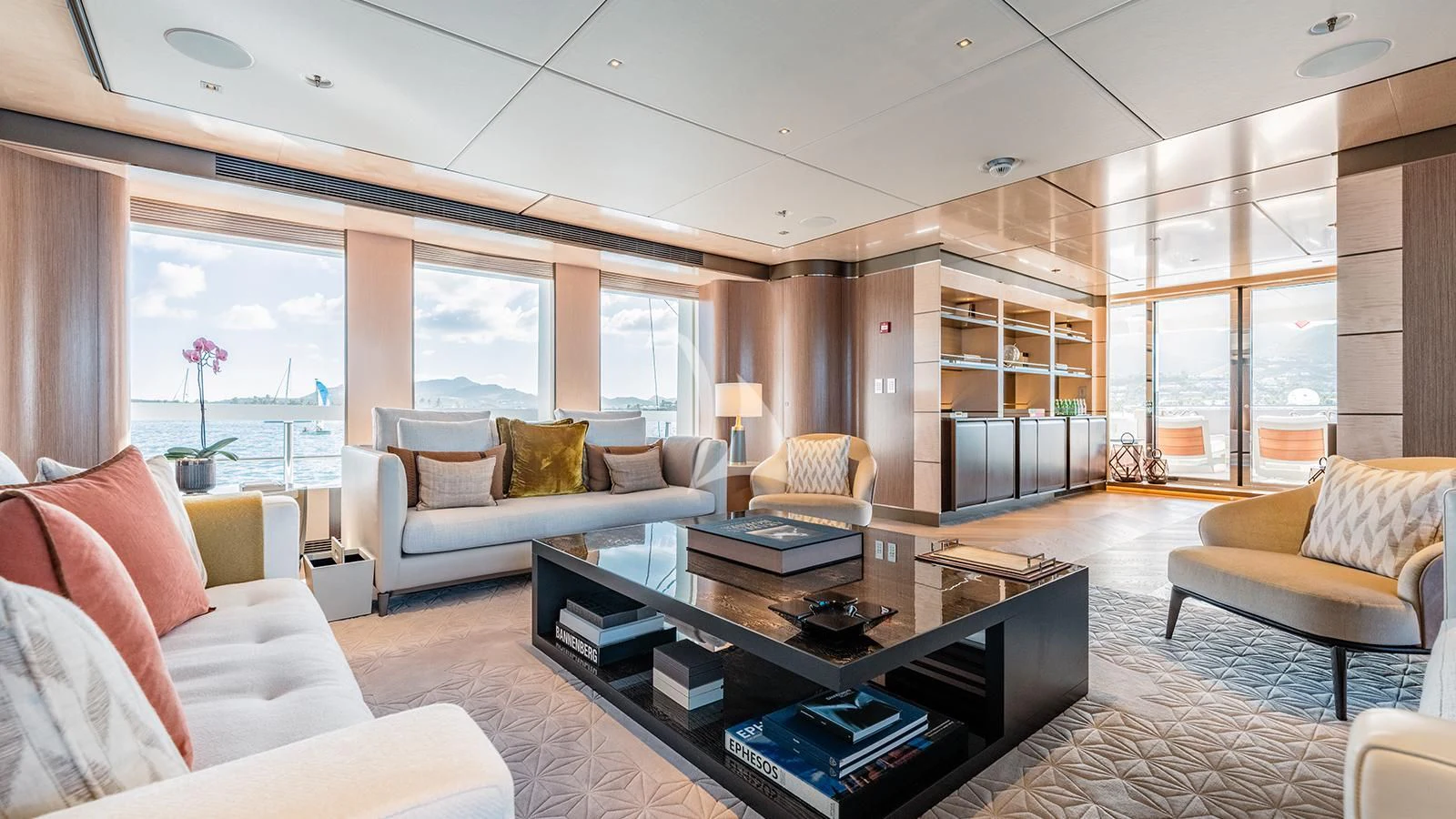 a living room with a large window aboard MOSKITO Yacht for Sale
