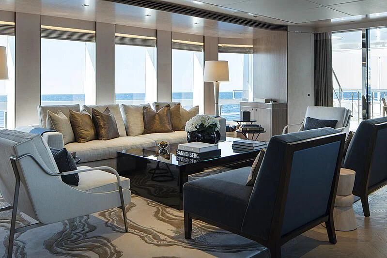 a living room with a couch and a coffee table aboard MOSKITO Yacht for Sale