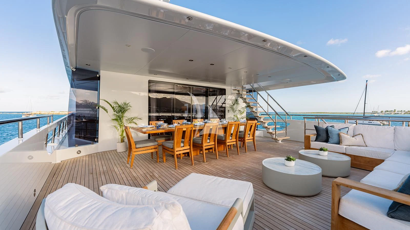 a large room with a balcony aboard MOSKITO Yacht for Sale
