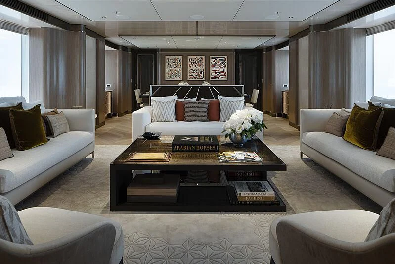 a living room with a coffee table aboard MOSKITO Yacht for Sale