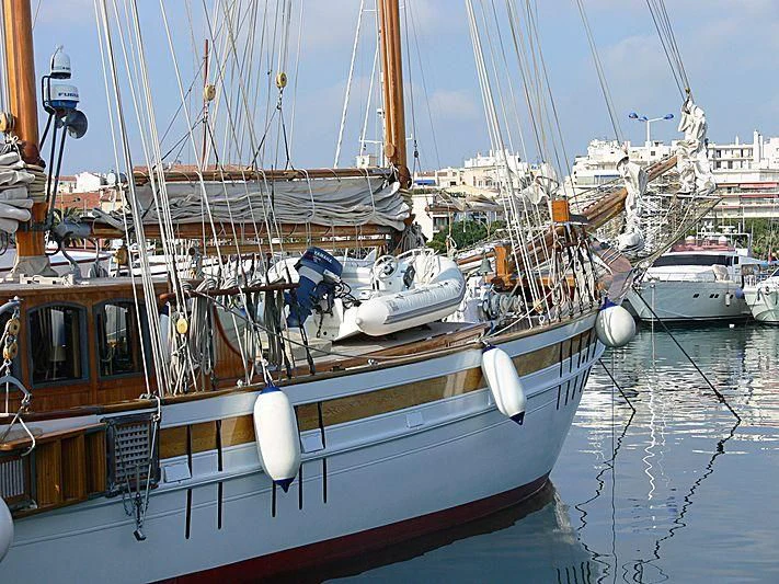 a boat docked in a harbor aboard LA MAIA Yacht for Sale